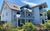 F: Haus Windrose Whg 02 Seeschwalbe mit Terrasse, Haus Windrose Whg 02 Seeschwalbe mit Terrasse in Thiessow auf Rgen (Ostseebad) - Blick vom Parkplatz auf das Haus Windrose