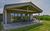 Gud Jard Lodge Nr. 20, Designferienhaus (20) mit exklusiver Ausstattung in Pellworm - Auenansicht mit berdachter Terrasse und seitlicher Sonnenterrasse