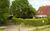 Ferienhaus in Nessmersiel 80-048b, 800-048b in Neßmersiel - Blick vom Vordeich aufs Haus