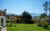 Ferienwohnung am Moos in Moosrain in Murnau am Staffelsee - Blick über den Garten in die Berge