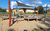 Torhaus Terra Nova, Ferienzimmer &#039;Wald&#039; in Elsterheide OT Sabrodt - Blick auf die Terrasse des Hofcafés
