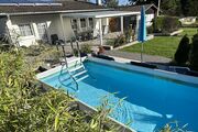 überdachte Terrasse mit Pool