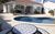 Ferienhaus Catalan in Miami Playa - Innenansicht mit Pool