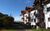 Ferienwohnung Chiemseestrand in Chieming-Arlaching - Wohnung mit gelbem Sonnenschirm