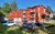Villa San Remo, Appartement 04 in Heringsdorf (Seebad) - Auenansicht mit Parkplatz
