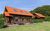 Blockhausferien Rgen - Meerblick - eigene Sauna, &#039;Alexander von Humboldt&#039; 2. Reihe Meerblick - eige in Sassnitz auf Rgen - Auenansicht mit Terrasse