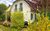 Ferienhaus Klnderberg in Binz, Ferienhaus &#039;Klnderberg&#039; in Binz in Binz (Ostseebad) - Hausansicht mit Gartenanlage