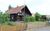 Holzblockhaus mit Kamin am Kite-, Surf- und Badestrand, Holzblockhaus in Loissin - Auenansicht